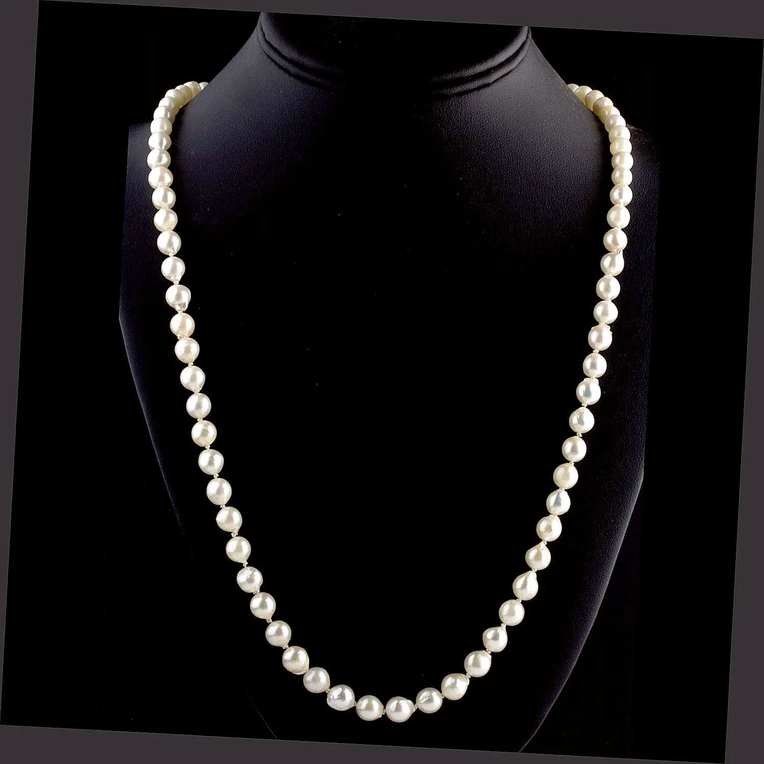 Vintage pearl necklaceJapanese Akoya semi-baroque  7mm beads 24 inches. nlfn120